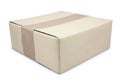 closed cardboard box taped up and isolated Royalty Free Stock Photo