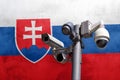 Closed circuit camera Multi-angle CCTV system against the background of the national flag of Slovakia