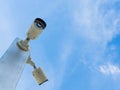 Closed-circuit television or CCTV Security camera on blue sky background Royalty Free Stock Photo