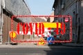 Closed city street construction or reconstruction site with road work barriers and signs due to coronavirus or covid 19 virus pand Royalty Free Stock Photo