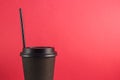 Closed Coffee Cup on red background