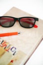 Closed diary with glasses and pen Royalty Free Stock Photo