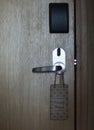 Closed-door of the hotel room with privacy please Royalty Free Stock Photo