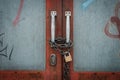 Closed door locked with chain and padlock - vintage gate Royalty Free Stock Photo