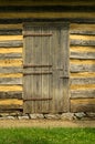 Wall of a Log Cabin with Doorway Royalty Free Stock Photo