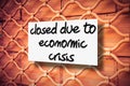 Closed due to economic crisis - concept image Royalty Free Stock Photo