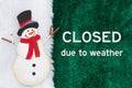 Closed due to weather message with a snowman