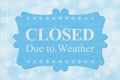 Closed Due to Weather message on a wood sign Royalty Free Stock Photo