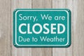 Closed due to weather sign