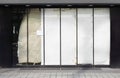 closed or empty shop or store storefront with blocked windows Royalty Free Stock Photo