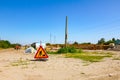 Closed enter at building site zone, triangle warning sign, construction works Royalty Free Stock Photo