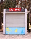 Closed fast food booth with jolly roger sign Royalty Free Stock Photo