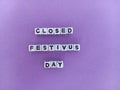 Closed festivus day sign on a purple background