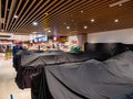 Closed food stalls covered in black tarpaulin cloth in Singapore