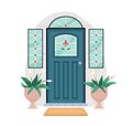 Closed front door of house outside. Home entrance exterior with stained glass, windows, potted plants flowers. Doorway Royalty Free Stock Photo