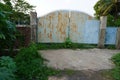 Closed gate of industrial factory, A old closed factory gate.