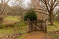 Closed gate on pathway in winter