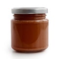 Closed glass jar of brown tomato and red chilli pepper salsa. Is