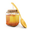 Closed glass jar of honey with wooden spoon on white.