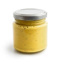 Closed glass jar of yellow curry sauce. in low perspect