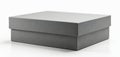 Closed grey box container made from styrofoam material sits on clean white surface. This object is perfect for product display, Royalty Free Stock Photo