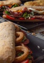 Closed image of sandwiches on wooden table with various ingredients and flavors