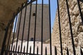 Closed iron gate preventing access to the keep of the medieval castle of Lorca, Murcia, Spain Royalty Free Stock Photo