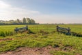 Closed iron gate between two heavy wooden beams Royalty Free Stock Photo