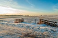 Closed iron gate in a winter landscape Royalty Free Stock Photo