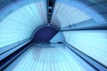 Solarium empty tanning bed in modern beauty salon Royalty Free Stock Photo