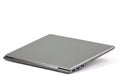 Closed lightweight silver laptop computer isolated