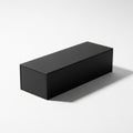 A Sleek Black Rectangular Box on a White Background with Soft Shadows Royalty Free Stock Photo