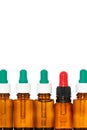 Closed medicine bottles with droppers