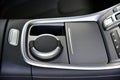 An ashtray on the console of a modern car Royalty Free Stock Photo