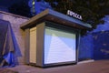 Closed news stall with inscription PRESS in Shchepkina street. Summer night view.