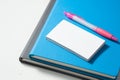 Closed notebook stack on white background with negative space Royalty Free Stock Photo