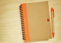 Closed notebook and a pen Royalty Free Stock Photo