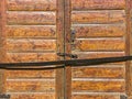 Closed rustic barn doors. brown weathered natural wood texture Royalty Free Stock Photo