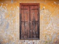 Closed old wooden window shutters. Royalty Free Stock Photo
