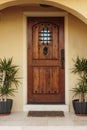 Closed Ornate Front Door of an Upscale Stucco House Royalty Free Stock Photo