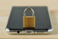 Closed padlock on smartphone - Concept of mobile security and data privacy