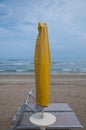 Closed parasols on the beach Sinigallia Royalty Free Stock Photo