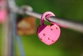 Closed pink padlock