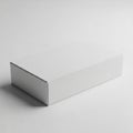Closed Plain White Rectangular Cardboard Box on a Light Gray Background with Soft Shadows Royalty Free Stock Photo