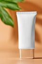 Closed plastic white tube of skin care cream. Copy space. Showcase
