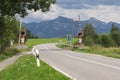 Closed railroad crossing in bavarian mountains Royalty Free Stock Photo
