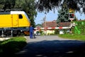 Closed railway crossing with traffic lights and barrier, StudÃÂ©nka, 4.9. 2021, Czech Republic