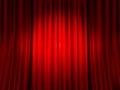 Closed red curtain. Spotlight round spot on red velvet veil background, drama theater, velours textile drape stage decor Royalty Free Stock Photo