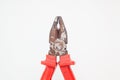 Closed rusty red pliers
