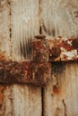 Closed rusty on an wooden door